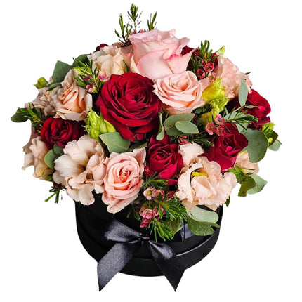 Luxuriöse Rosenbox mit frischen roten und rosafarbenen Rosen in Zürich online bestellen