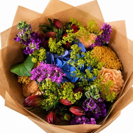 Bunter Blumenstrauss mit saisonalen Blumen in Regenbogenfarben online bestellen in Zürich mit frischer Blumenlieferung