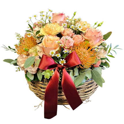 Blumenkorb Zürich mit Rosen Nelken Kamille und exotischen Blüten handgesteckt frisch online bestellen