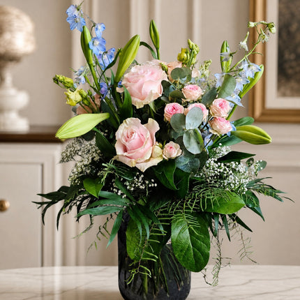 Pastell Blumenstrauss mit Rosen Lilien und saisonalen Blüten in Zürich online kaufen