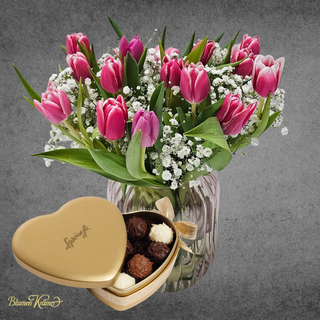 Strauss mit rosa Tulpen und Schleierkraut frisch gebunden in Zürich online kaufen