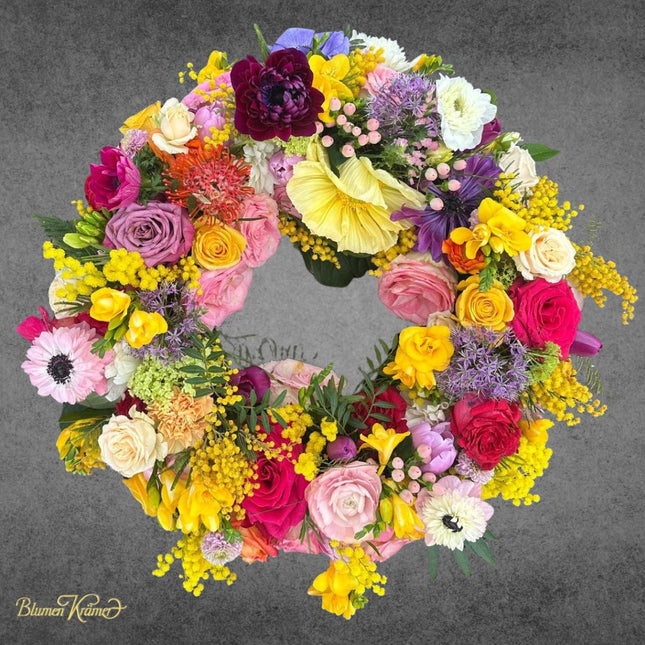 Trauerkranz mit Frühlingsblumen in Zürich kaufen frisch gebunden für Beerdigung Lieferung