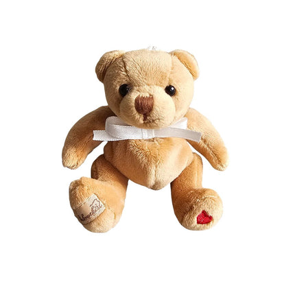 Kleiner Teddy Bär als Schlüsselanhänger in Braun mit Herz auf dem Fuss