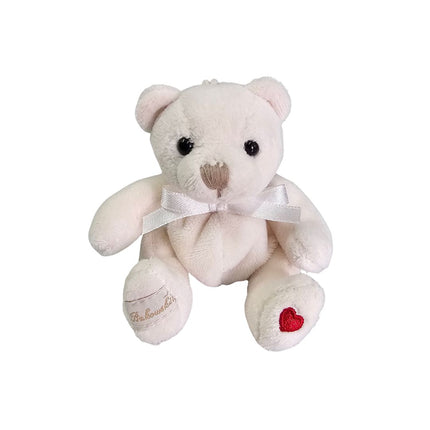 Kleiner Teddy Bär als Schlüsselanhänger in Weiss mit Herz auf dem Fuss