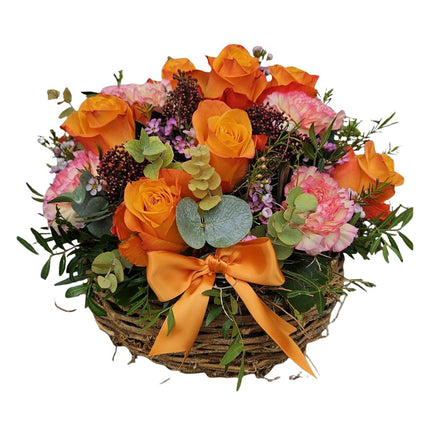 Herbstlicher Blumenkorb mit orangen Rosen frisch gebunden online bestellen Zürich