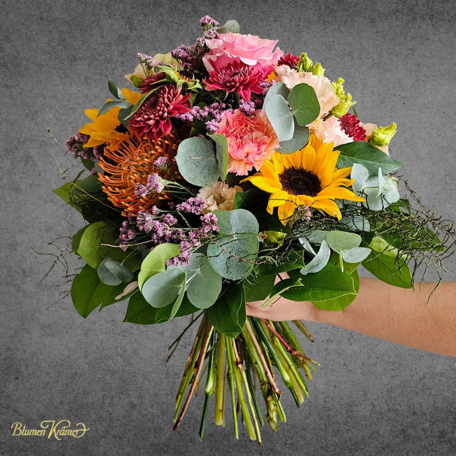 Herbststrauss mit Sonnenblumen, Lisianthus, Chrysanthemen und Nutans in warmen Farben frisch geliefert vom Blumenlieferservice Zürich
